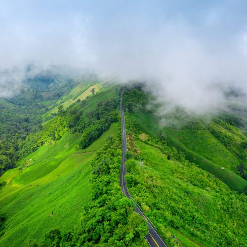 Aerial view of Beautiful sky road over top of mountains with gre Tour Packages in Thekkady - Best experience